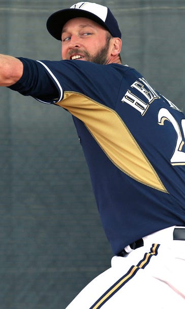 Former Brewers closer Henderson hoping he's able to pitch, contribute in '15